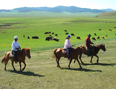 Horse riding through Orkhon Valley